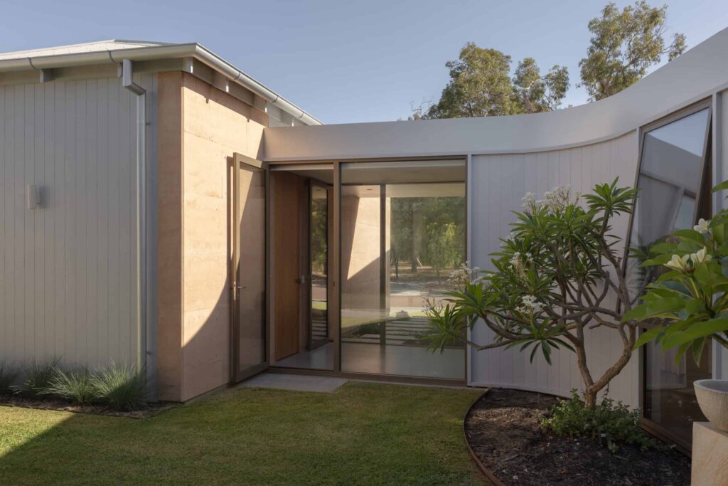 Carinya Select hinged aluminium door installed in a contemporary home